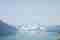 Photomontage sur la thématique du climat. Insertion d'un glacier dans le paysage de la photo prise autour du Lac du Bourget